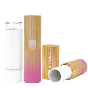 A natural bamboo lip balm container with a gradient pink finish, silk-printed logo, and a PETG refillable inner core. Holds 3.5g of product, suitable for lip balm, lipstick, or solid perfume.
