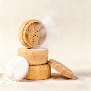 100% biodegradable bamboo loose powder jar with matching puff and bottom-fill design