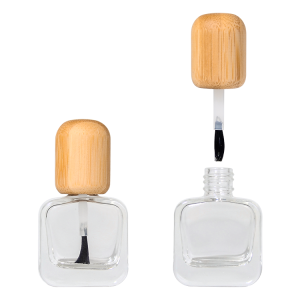 Empty glass gel nail bottle with bamboo cap and attached brush – eco-friendly 10ml packaging for gel polish